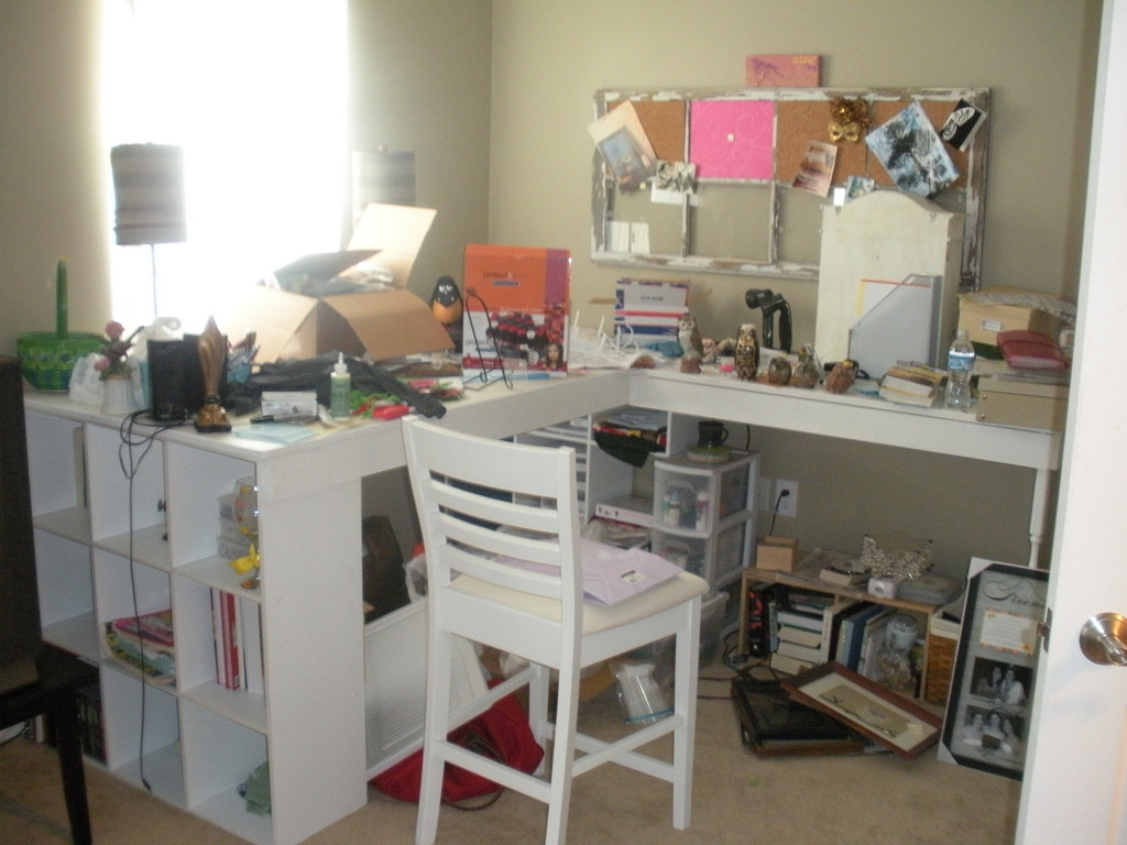 This is what my cluttered craft room looked like before I got to organize it